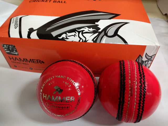 pair of red cricket balls